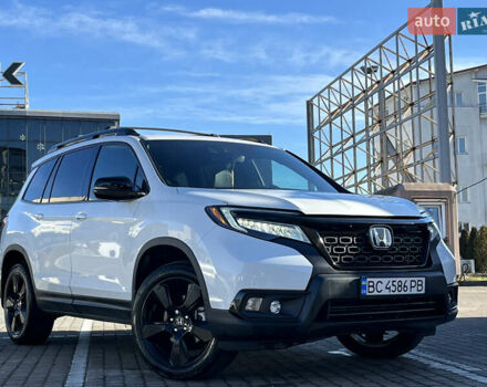 Белый Хонда Пасспорт, объемом двигателя 3.47 л и пробегом 14 тыс. км за 25499 $, фото 1 на Automoto.ua