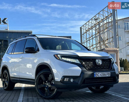 Белый Хонда Пасспорт, объемом двигателя 3.47 л и пробегом 14 тыс. км за 25499 $, фото 3 на Automoto.ua