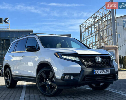 Белый Хонда Пасспорт, объемом двигателя 3.47 л и пробегом 14 тыс. км за 25499 $, фото 6 на Automoto.ua