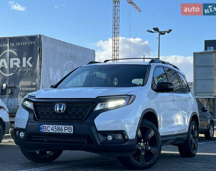 Белый Хонда Пасспорт, объемом двигателя 3.47 л и пробегом 14 тыс. км за 25499 $, фото 4 на Automoto.ua
