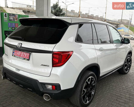 Белый Хонда Пасспорт, объемом двигателя 3.47 л и пробегом 50 тыс. км за 28000 $, фото 4 на Automoto.ua