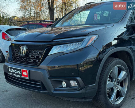 Черный Хонда Пасспорт, объемом двигателя 3.5 л и пробегом 159 тыс. км за 22490 $, фото 2 на Automoto.ua