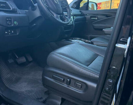 Черный Хонда Пасспорт, объемом двигателя 3.47 л и пробегом 90 тыс. км за 32000 $, фото 11 на Automoto.ua