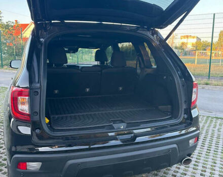 Черный Хонда Пасспорт, объемом двигателя 3.47 л и пробегом 90 тыс. км за 32000 $, фото 9 на Automoto.ua