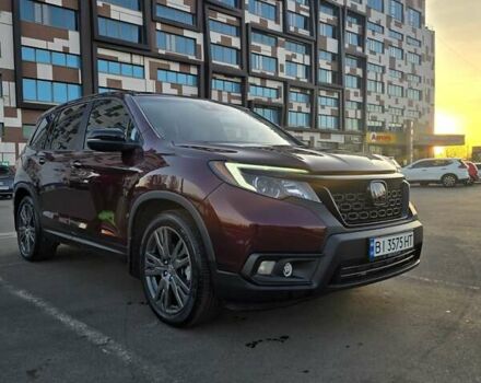 Красный Хонда Пасспорт, объемом двигателя 3.47 л и пробегом 87 тыс. км за 21999 $, фото 4 на Automoto.ua