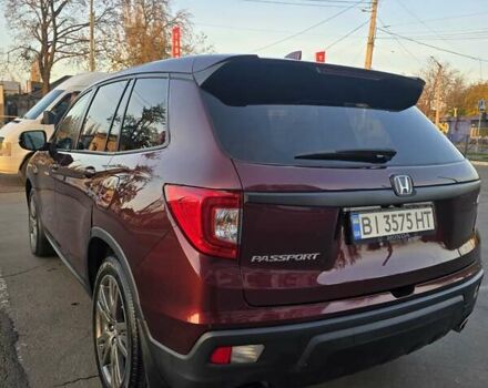 Красный Хонда Пасспорт, объемом двигателя 3.47 л и пробегом 87 тыс. км за 21999 $, фото 3 на Automoto.ua