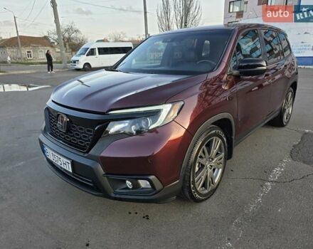 Красный Хонда Пасспорт, объемом двигателя 3.47 л и пробегом 87 тыс. км за 21999 $, фото 60 на Automoto.ua