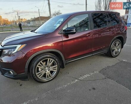 Красный Хонда Пасспорт, объемом двигателя 3.47 л и пробегом 87 тыс. км за 21999 $, фото 52 на Automoto.ua