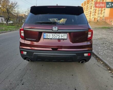 Красный Хонда Пасспорт, объемом двигателя 3.47 л и пробегом 87 тыс. км за 21999 $, фото 58 на Automoto.ua