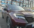 Красный Хонда Пасспорт, объемом двигателя 3.47 л и пробегом 87 тыс. км за 21999 $, фото 1 на Automoto.ua