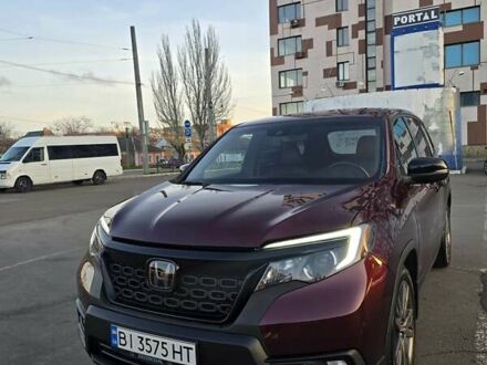 Красный Хонда Пасспорт, объемом двигателя 3.47 л и пробегом 87 тыс. км за 21999 $, фото 1 на Automoto.ua