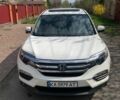 Белый Хонда Пилот, объемом двигателя 3.47 л и пробегом 145 тыс. км за 21000 $, фото 1 на Automoto.ua