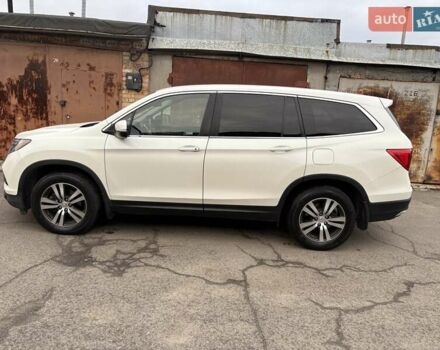 Белый Хонда Пилот, объемом двигателя 3.5 л и пробегом 125 тыс. км за 20500 $, фото 1 на Automoto.ua