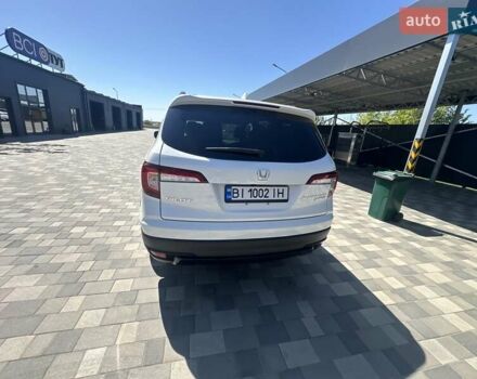 Білий Хонда Пілот, об'ємом двигуна 3.47 л та пробігом 51 тис. км за 34000 $, фото 121 на Automoto.ua