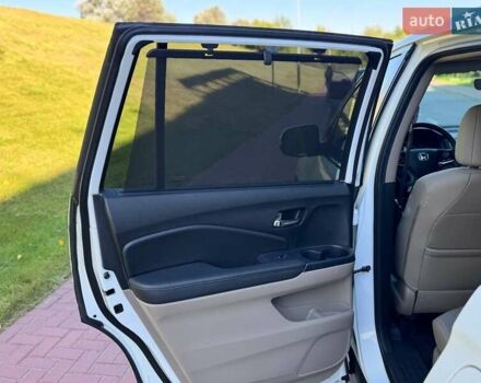 Белый Хонда Пилот, объемом двигателя 3.47 л и пробегом 151 тыс. км за 27000 $, фото 26 на Automoto.ua