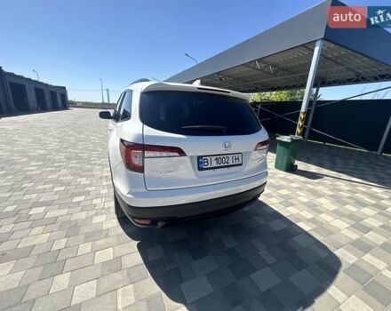 Білий Хонда Пілот, об'ємом двигуна 3.47 л та пробігом 51 тис. км за 34000 $, фото 122 на Automoto.ua