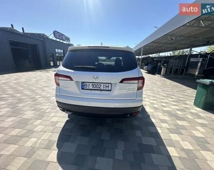 Білий Хонда Пілот, об'ємом двигуна 3.47 л та пробігом 51 тис. км за 34000 $, фото 118 на Automoto.ua
