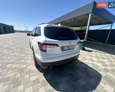 Білий Хонда Пілот, об'ємом двигуна 3.47 л та пробігом 51 тис. км за 34000 $, фото 123 на Automoto.ua