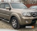 Бежевий Хонда Пілот, об'ємом двигуна 3.5 л та пробігом 219 тис. км за 13800 $, фото 1 на Automoto.ua