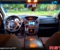 Чорний Хонда Пілот, об'ємом двигуна 3.5 л та пробігом 203 тис. км за 13300 $, фото 4 на Automoto.ua