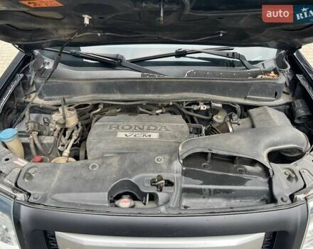 Черный Хонда Пилот, объемом двигателя 3.5 л и пробегом 274 тыс. км за 11500 $, фото 54 на Automoto.ua