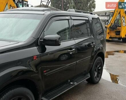 Чорний Хонда Пілот, об'ємом двигуна 3.5 л та пробігом 323 тис. км за 12500 $, фото 4 на Automoto.ua