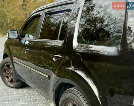 Чорний Хонда Пілот, об'ємом двигуна 3.5 л та пробігом 201 тис. км за 11999 $, фото 36 на Automoto.ua