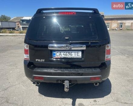Чорний Хонда Пілот, об'ємом двигуна 3.47 л та пробігом 236 тис. км за 13500 $, фото 6 на Automoto.ua