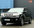 Черный Хонда Пилот, объемом двигателя 3.47 л и пробегом 296 тыс. км за 10600 $, фото 1 на Automoto.ua