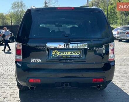 Чорний Хонда Пілот, об'ємом двигуна 3.47 л та пробігом 331 тис. км за 13700 $, фото 4 на Automoto.ua