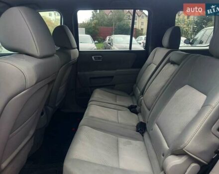 Хонда Пілот 2011 у Рівному на Automoto.ua Чорний Хонда Пілот, об'ємом двигуна 3.5 л та пробігом 230 тис. км за 11300 $, фото 12 на Automoto.ua