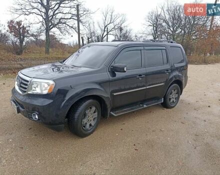 Чорний Хонда Пілот, об'ємом двигуна 3.47 л та пробігом 242 тис. км за 11500 $, фото 1 на Automoto.ua