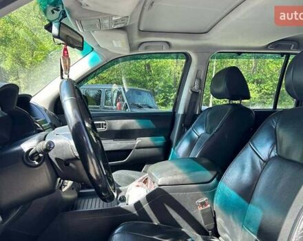 Чорний Хонда Пілот, об'ємом двигуна 3.47 л та пробігом 331 тис. км за 13700 $, фото 9 на Automoto.ua