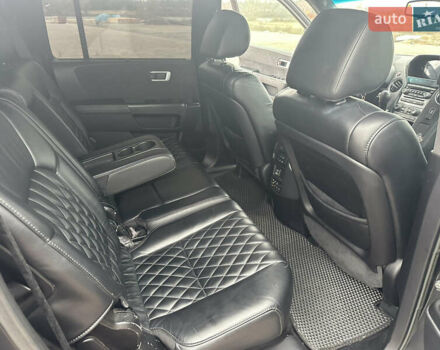 Черный Хонда Пилот, объемом двигателя 3.47 л и пробегом 210 тыс. км за 12500 $, фото 6 на Automoto.ua