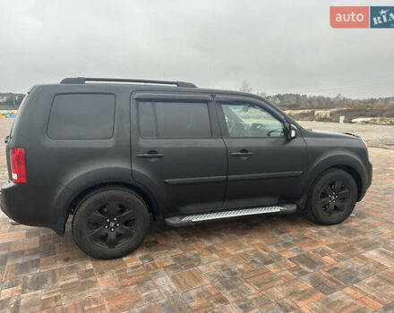 Черный Хонда Пилот, объемом двигателя 3.47 л и пробегом 210 тыс. км за 12500 $, фото 3 на Automoto.ua