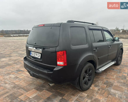 Черный Хонда Пилот, объемом двигателя 3.47 л и пробегом 210 тыс. км за 12500 $, фото 4 на Automoto.ua