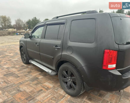 Черный Хонда Пилот, объемом двигателя 3.47 л и пробегом 210 тыс. км за 12500 $, фото 13 на Automoto.ua