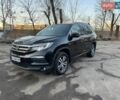 Черный Хонда Пилот, объемом двигателя 3 л и пробегом 200 тыс. км за 24000 $, фото 1 на Automoto.ua