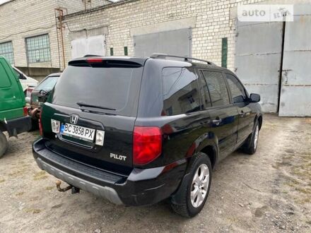 Черный Хонда Пилот, объемом двигателя 3.5 л и пробегом 358 тыс. км за 6800 $, фото 1 на Automoto.ua
