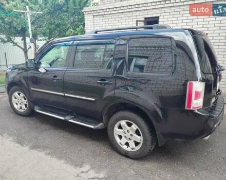 Чорний Хонда Пілот, об'ємом двигуна 3.5 л та пробігом 244 тис. км за 11500 $, фото 1 на Automoto.ua