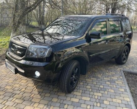 Черный Хонда Пилот, объемом двигателя 3.5 л и пробегом 59 тыс. км за 18000 $, фото 1 на Automoto.ua