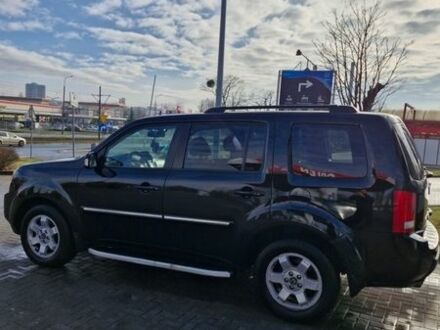 Черный Хонда Пилот, объемом двигателя 3.47 л и пробегом 170 тыс. км за 11000 $, фото 1 на Automoto.ua
