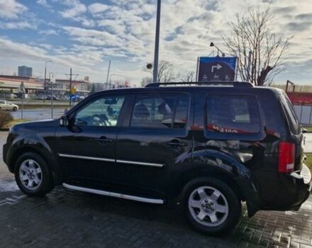 Черный Хонда Пилот, объемом двигателя 3.47 л и пробегом 170 тыс. км за 11000 $, фото 1 на Automoto.ua