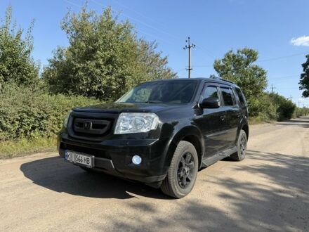 Чорний Хонда Пілот, об'ємом двигуна 3.5 л та пробігом 345 тис. км за 11485 $, фото 1 на Automoto.ua