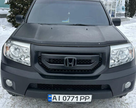 Черный Хонда Пилот, объемом двигателя 3.47 л и пробегом 220 тыс. км за 11500 $, фото 1 на Automoto.ua