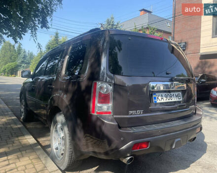 Коричневий Хонда Пілот, об'ємом двигуна 3.47 л та пробігом 298 тис. км за 14500 $, фото 4 на Automoto.ua