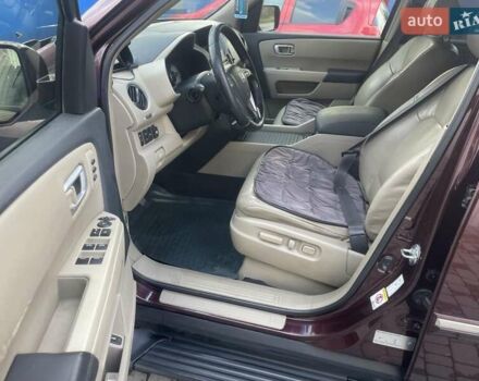 Червоний Хонда Пілот, об'ємом двигуна 3.47 л та пробігом 350 тис. км за 11500 $, фото 21 на Automoto.ua