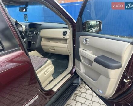 Червоний Хонда Пілот, об'ємом двигуна 3.47 л та пробігом 350 тис. км за 11500 $, фото 11 на Automoto.ua