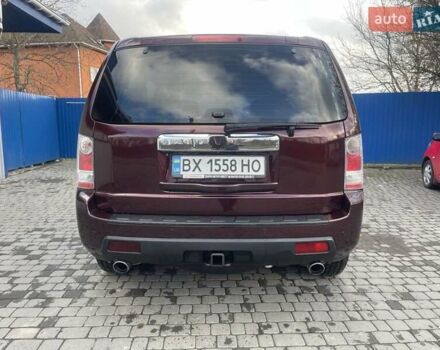 Червоний Хонда Пілот, об'ємом двигуна 3.47 л та пробігом 350 тис. км за 11500 $, фото 4 на Automoto.ua