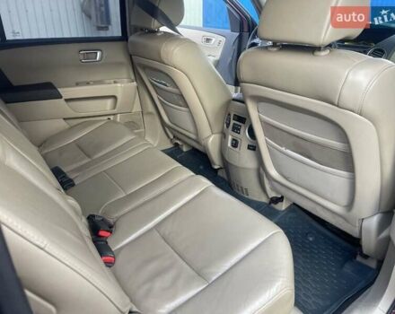 Червоний Хонда Пілот, об'ємом двигуна 3.47 л та пробігом 350 тис. км за 11500 $, фото 12 на Automoto.ua